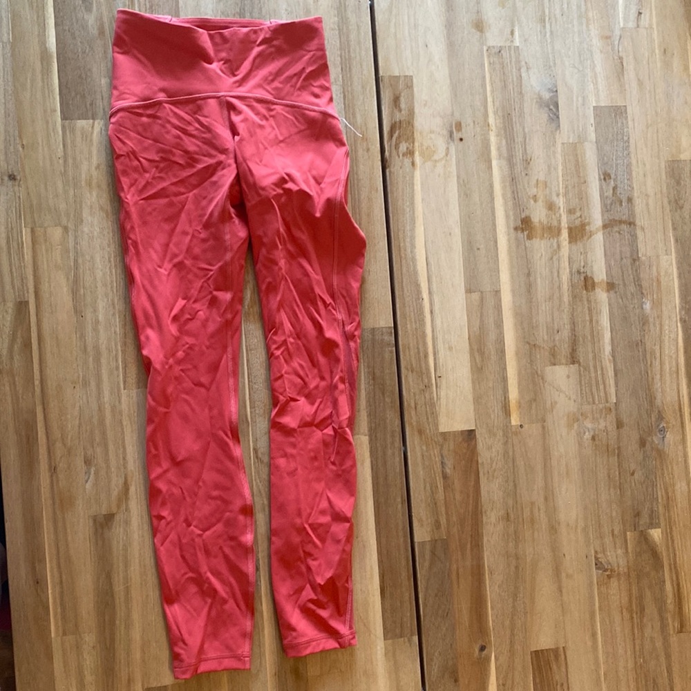 Never worn lulu lemon size 2 pink leggings